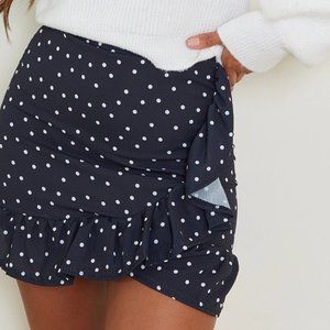 PrettyLittleThing Black & White Polka Dot Peplum Mini Skirt